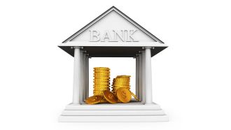 Gold coins in bank safe related to finance stock photo
